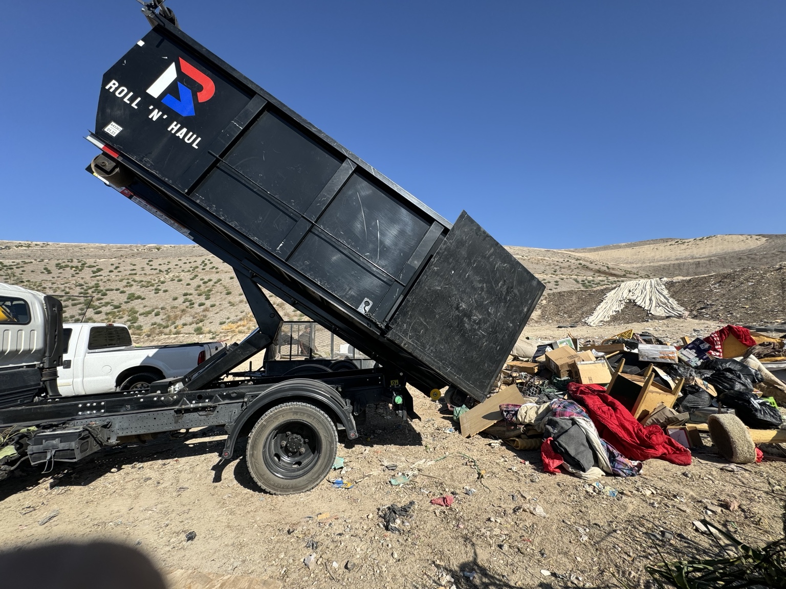 Roll N Haul dumping junk and debris
